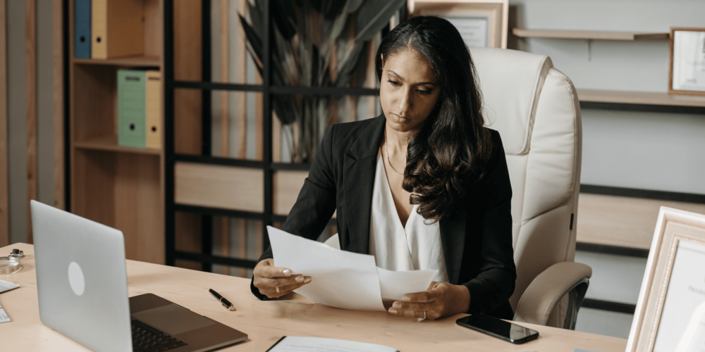 Codekeeper legal expert reviewing software escrow release triggers.
